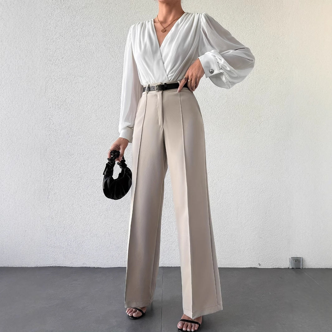Stylish model showcasing 2025 New Fashion Temperament High Waist Slimming And Straight Casual Trousers in apricot.